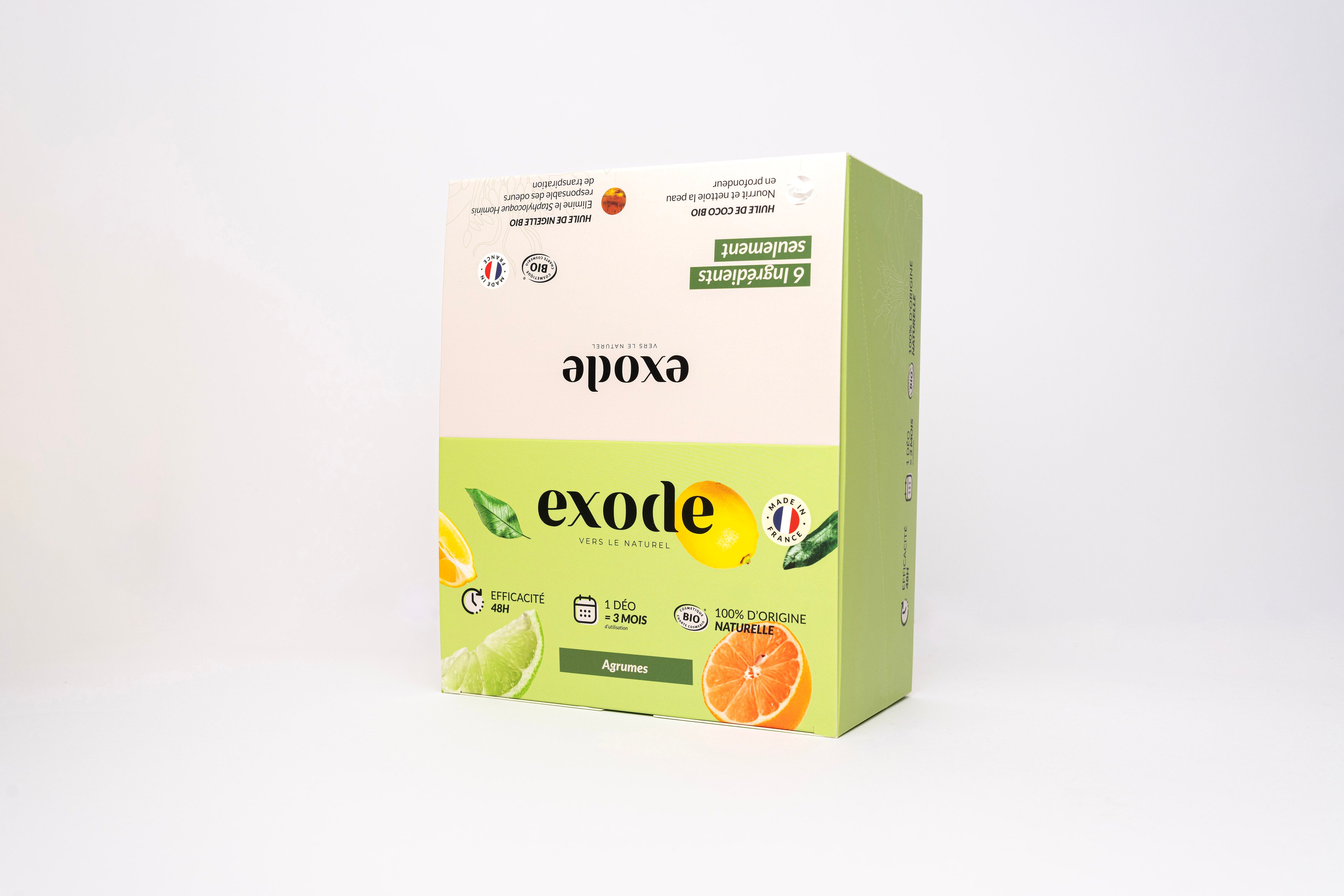 A green and beige 'Exode' product box with citrus fruit and organic labels.